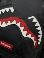 MORRAL SPRAYGROUND MORDIDA